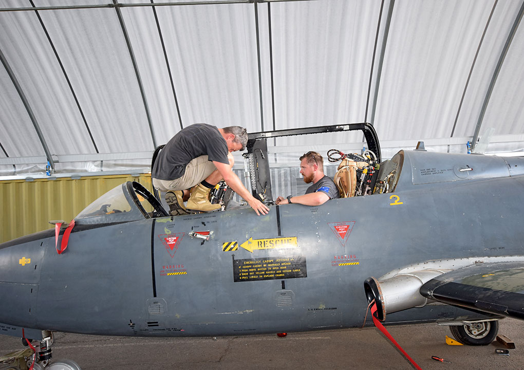 Hunter Fighter Collection volunteers prepare Aermacchi MB-326 RAAF A7-047 for transport from RAAF Amberley to Scone NSW