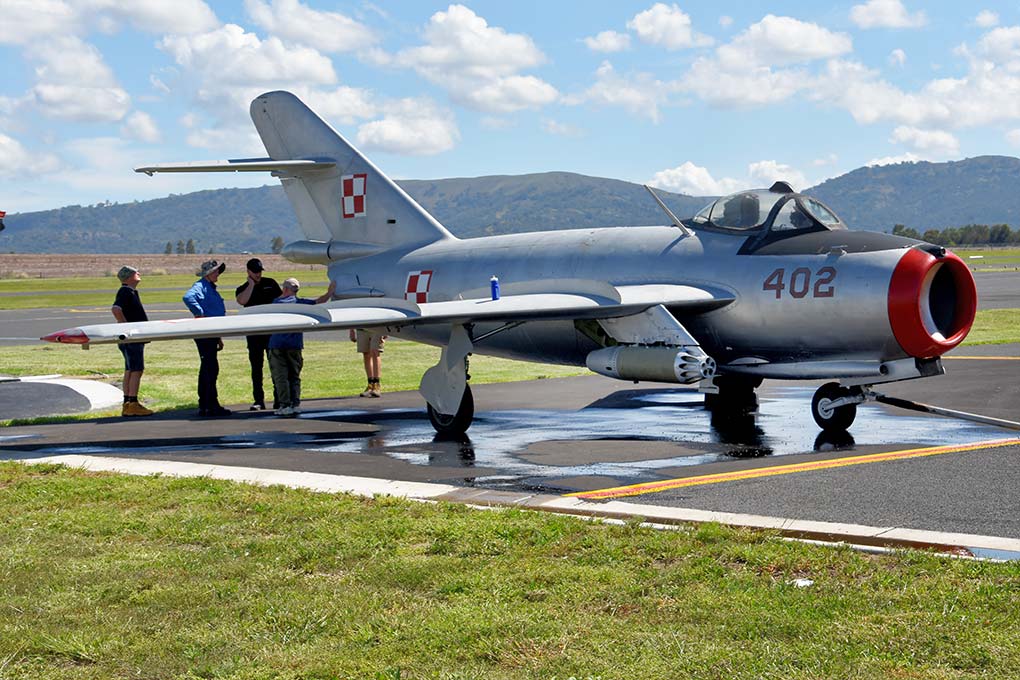 Hunter Fighter Collection volunteers wash MiG-17F at Scone NSW